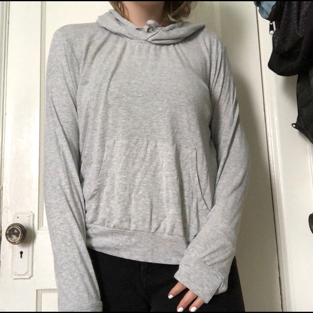 A light grey sweatshirt with a pocket
